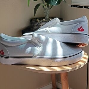 White Slip-On Canvas Sneakers with Red Flame Logo